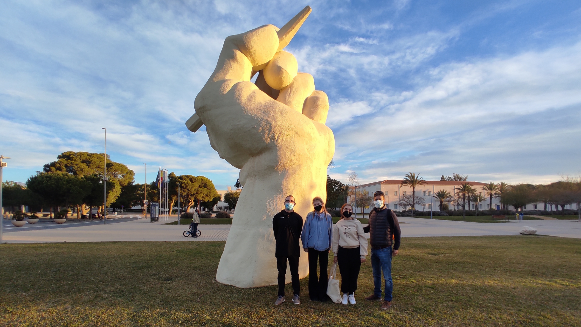 Students in front of statue